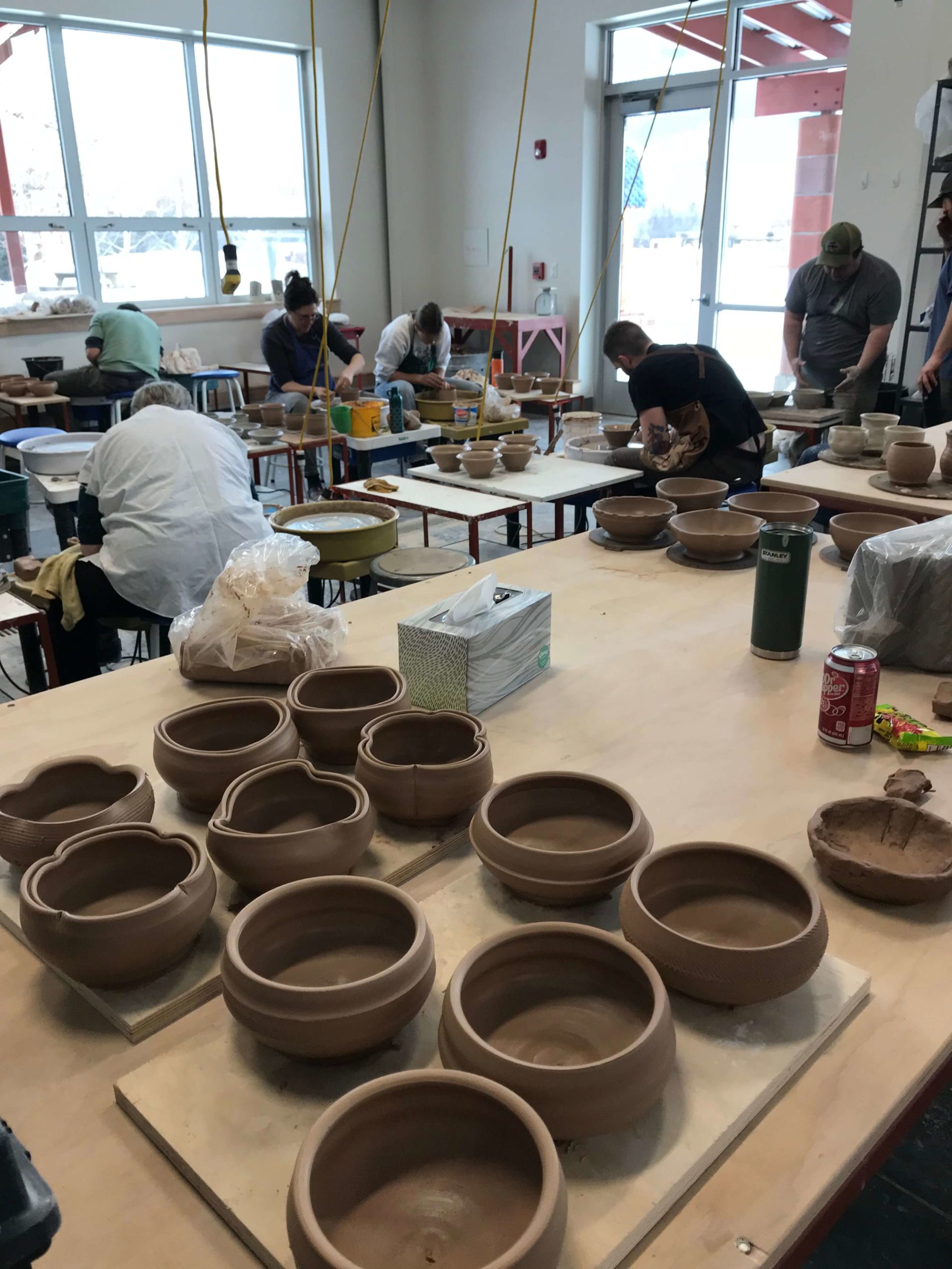 People in classroom for Mothers Day Throwing event