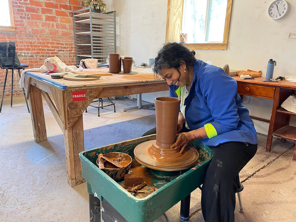 Bray Resident—Sharbani Das Gupta, working on a clay wheel