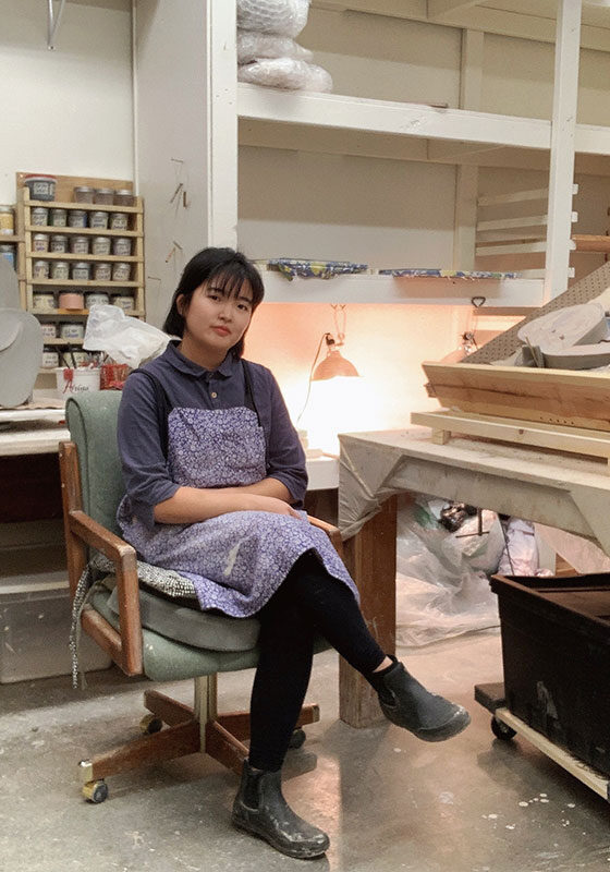 Long-term Resident Soojin Choi in Studio with art work